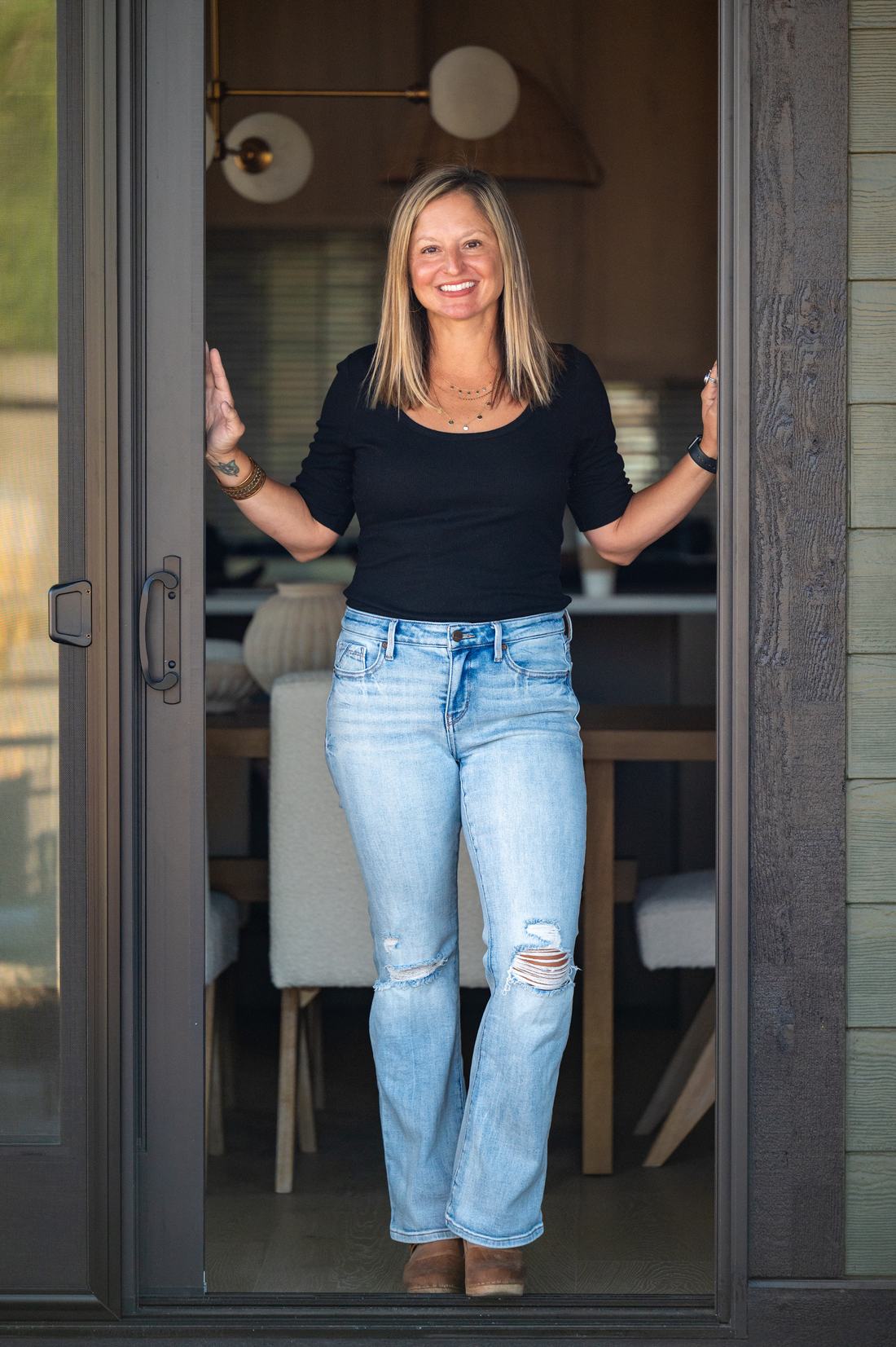 Allison Rayburn standing in an open doorway